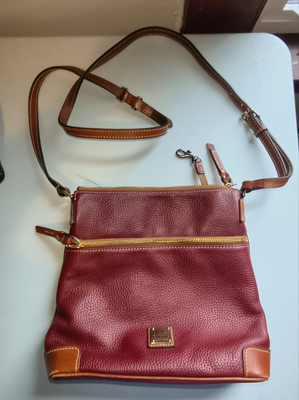 Dooney & Bourke Wine Pebbled Leather Crossbody with Tan Trim